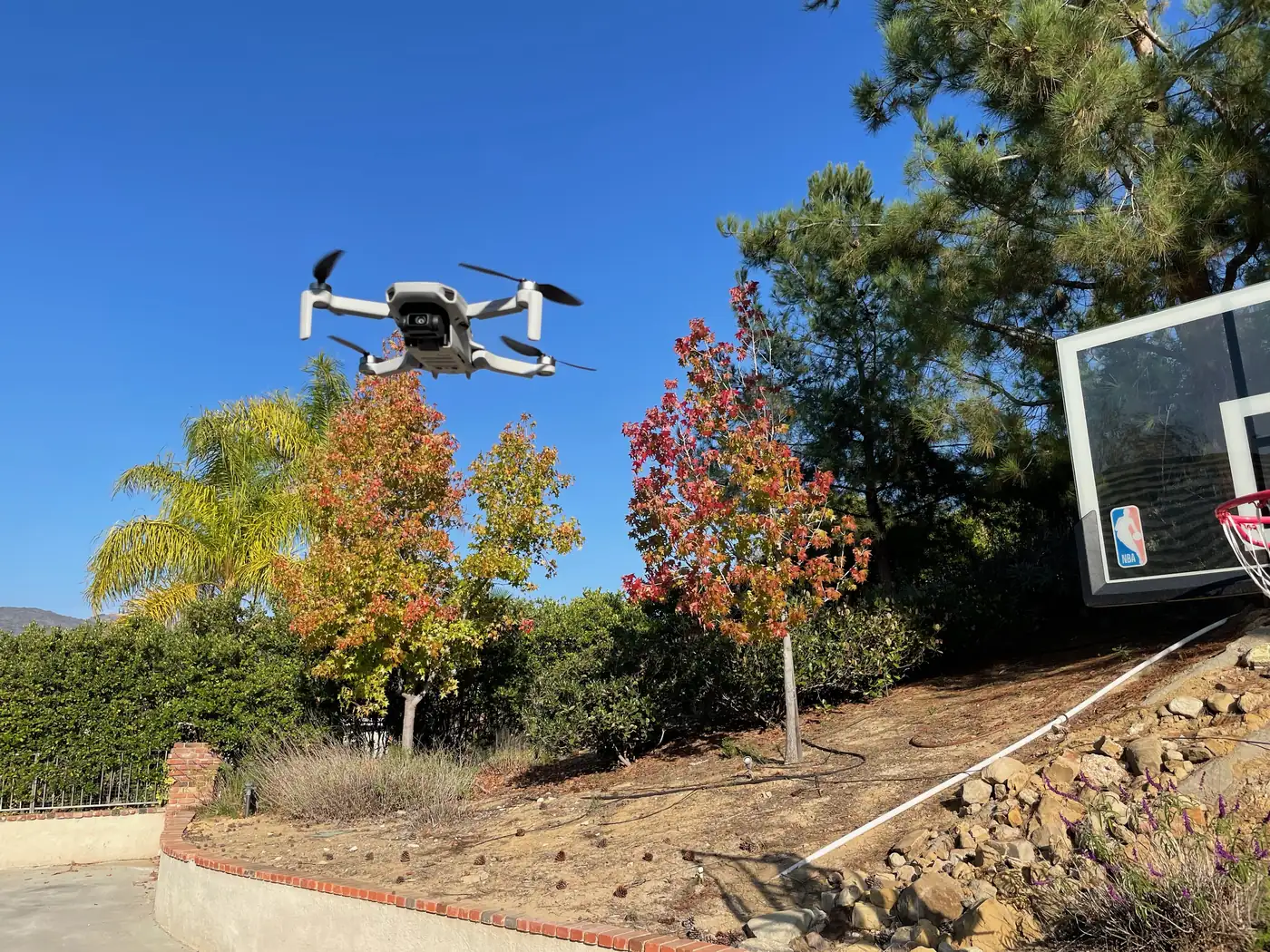 Inspection drone lifting off at the start of a roof survey